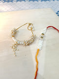 Elegant Pearl Beaded Rakhi with Kundan Embellishments